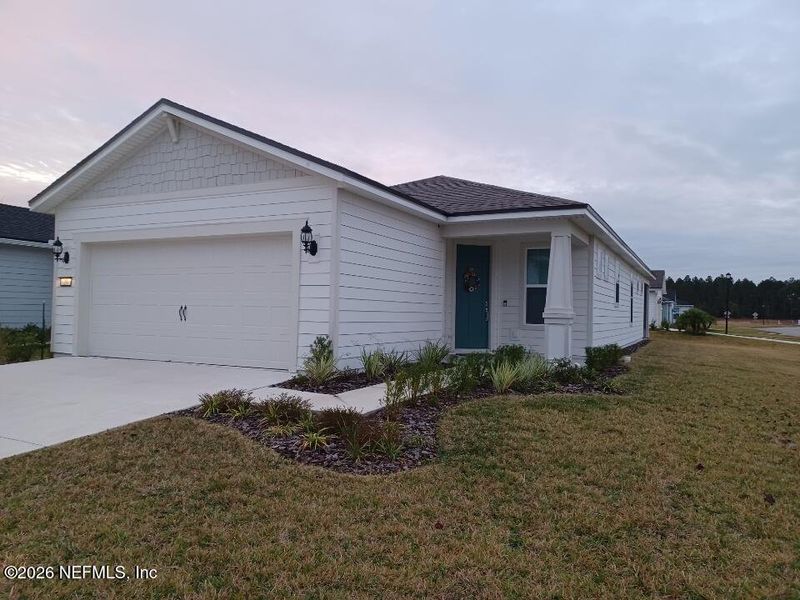 Front exterior of a new home in , St. Augustine, FL, highlighting curb appeal (Image 1). Front exterior of a new home in , St. Augustine, FL, highlighting curb appeal (Image 1).