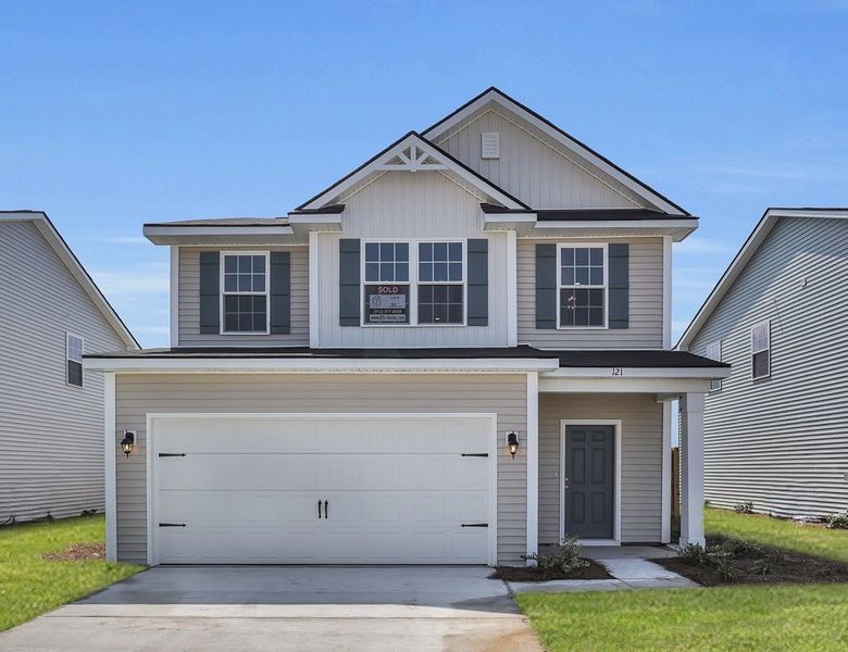 Representative exterior photo of a completed home built from the The Morris by RTS Homes in Grand Reserve, Hinesville, GA (Image 25).