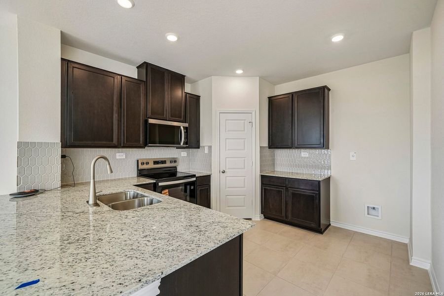 Furnished interior view inside a new home in Woodside Farms, Seguin (Image 8).