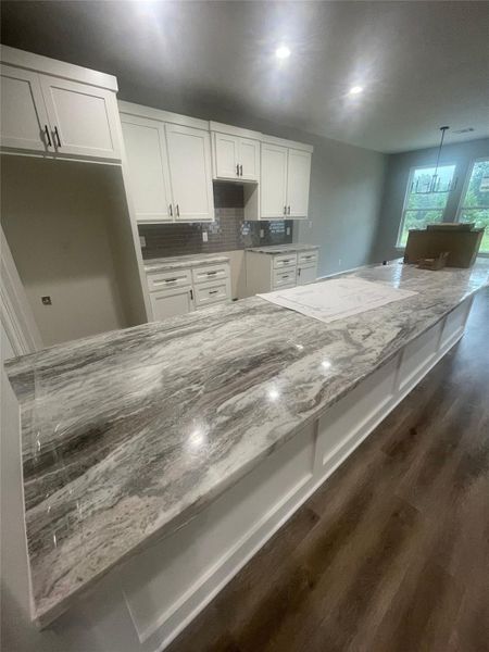 Furnished interior view inside a new home in , New Waverly (Image 3).