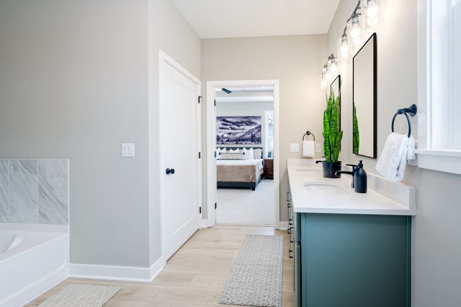 Representative furnished interior of a home built from the Morgan by Fischer Homes in Easton Park, Dallas (Image 26).