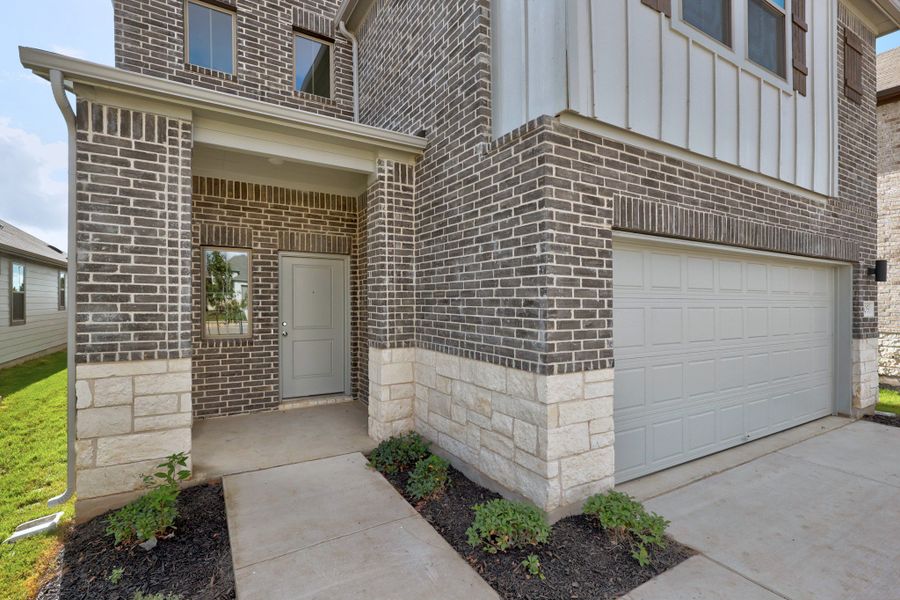Exterior details and patio area of a home in Trinity Ranch, Elgin (Image 3).