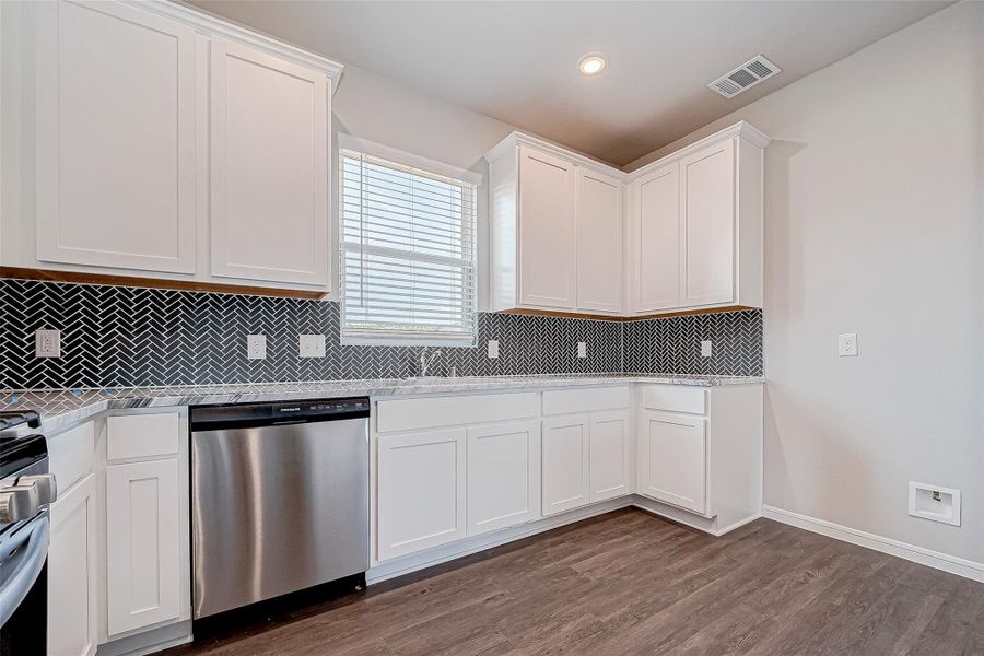 Furnished interior view inside a new home in Mill Creek Trails, Magnolia (Image 14).