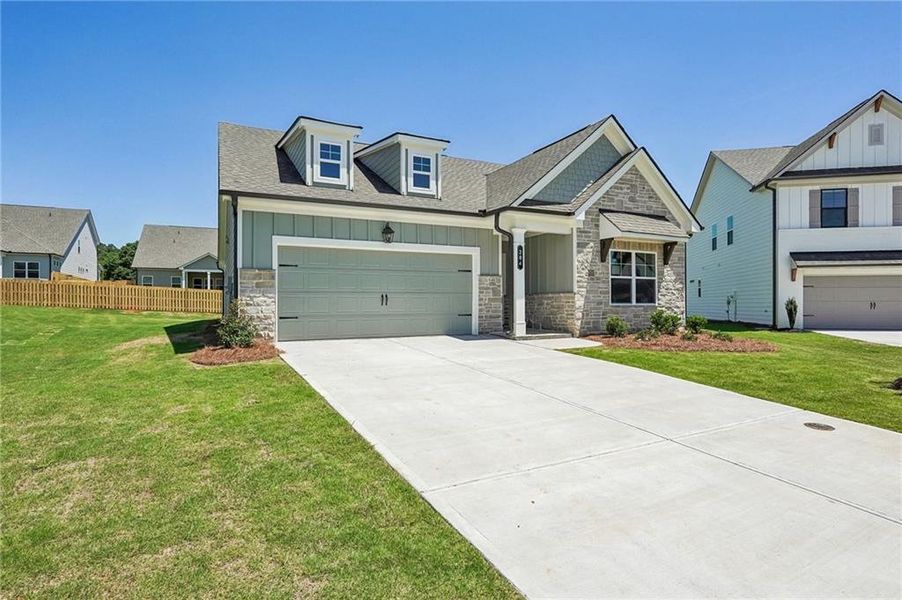 Front exterior of a new home in Garland Meadows, Cartersville, GA, highlighting curb appeal (Image 26). Front exterior of a new home in Garland Meadows, Cartersville, GA, highlighting curb appeal (Image 26).