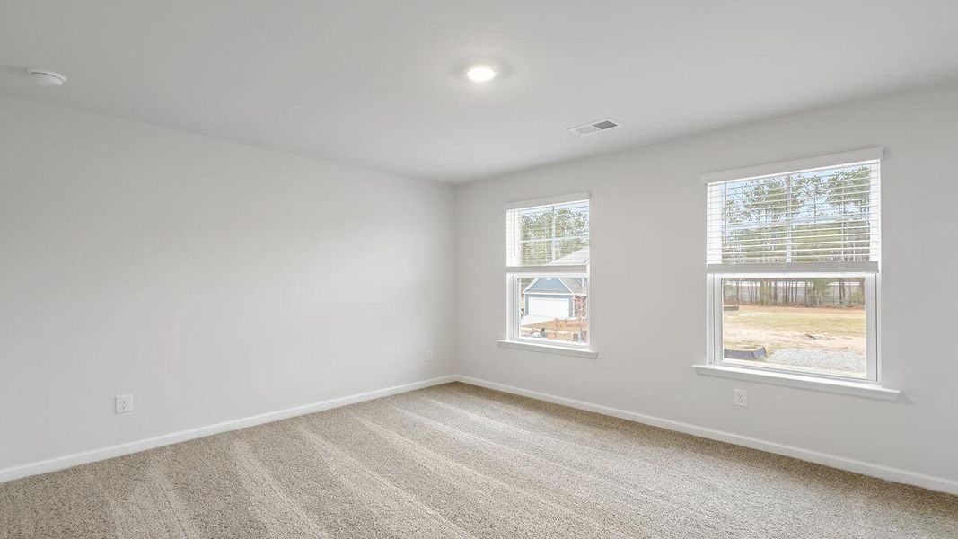 Spacious, unfurnished interior of a new home in The Cove at Mallard Crossing, Summerville (Image 23).
