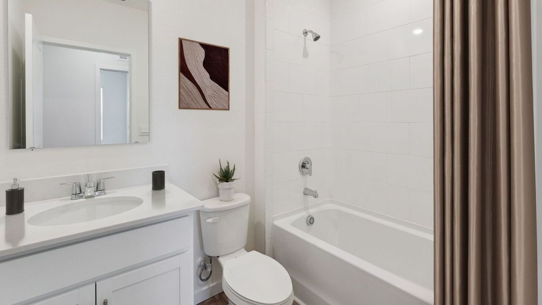 Representative furnished interior of a home built from the Baldwin by D.R. Horton in Crossroads at Kelly Park, Apopka (Image 14).