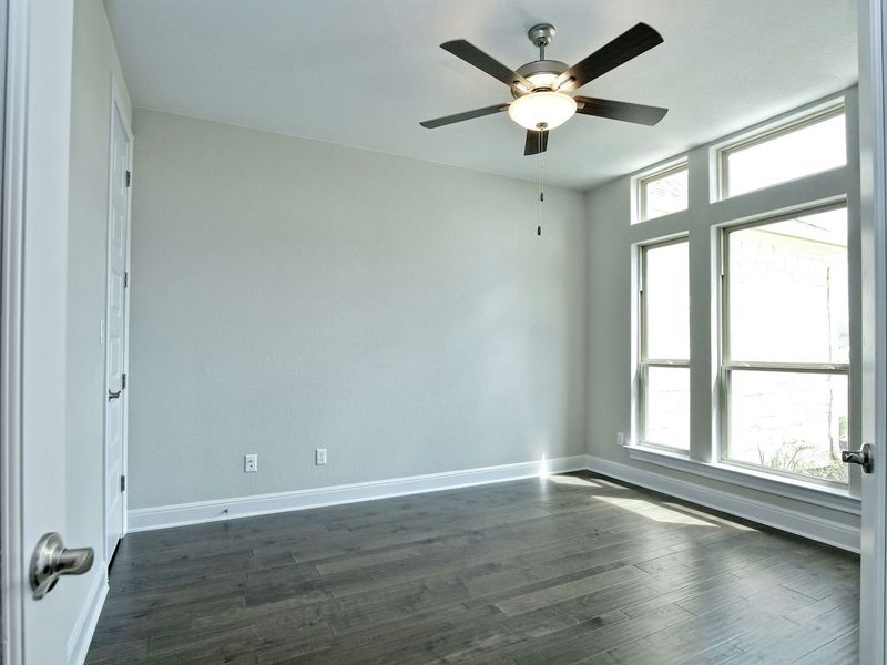 Representative unfurnished interior of a home built from the Madera II by Giddens Homes in Scofield Farms Estates, Georgetown (Image 384).
