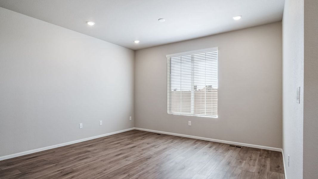 Spacious, unfurnished interior of a new home in The Reserve at Green Valley Ranch, Aurora (Image 19).