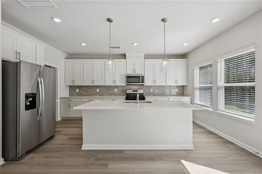 Furnished interior view inside a new home in Parkside at Grayson, Grayson (Image 4).