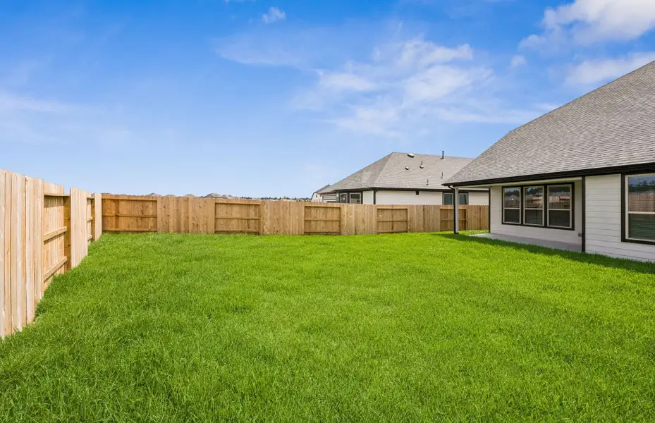 Exterior details and patio area of a home in Mavera, Conroe (Image 4).