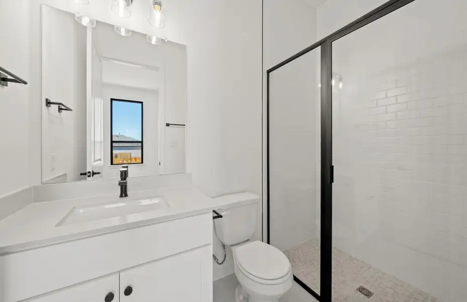 Furnished interior view inside a new home in 6 Creeks, Kyle (Image 5).