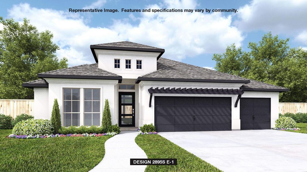 View of front of house with a garage and a front yard