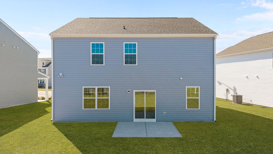 Exterior details and patio area of a home in Ridgewood Farms, Winterville (Image 16).