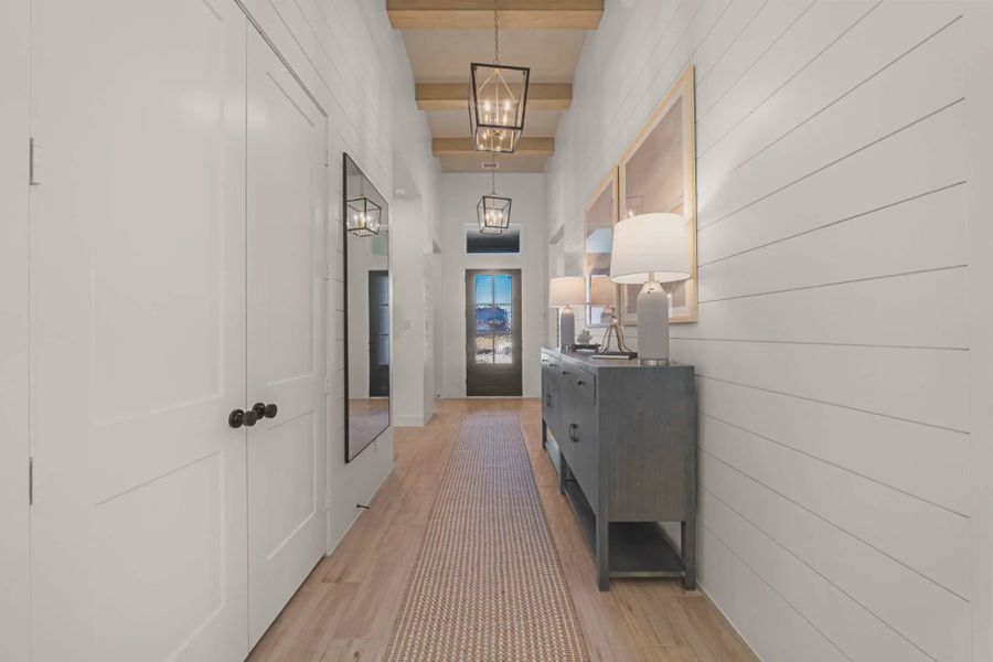 Representative furnished interior of a home built from the Hampton by Chesmar Homes in Meridiana 50's and 60's, Manvel (Image 13).