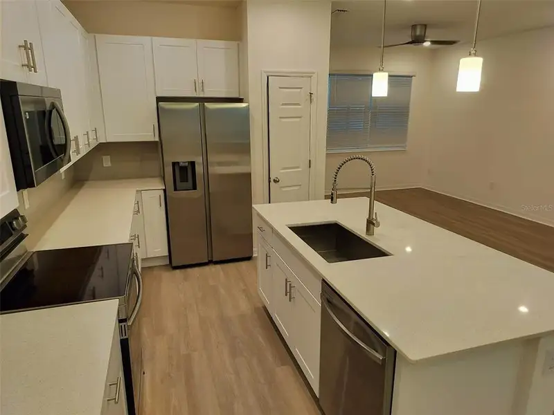 Furnished interior view inside a new home in Loch Leven Park, Mount Dora (Image 6).