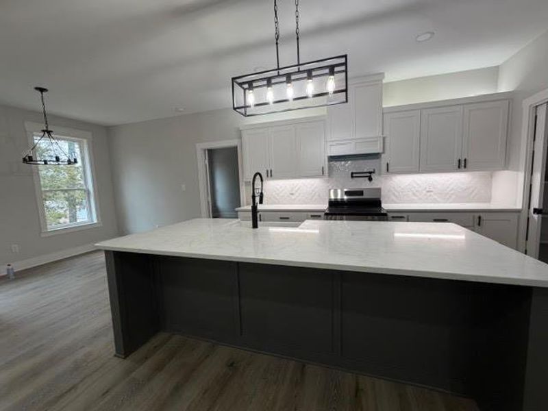 Furnished interior view inside a new home in , Mineola (Image 13).