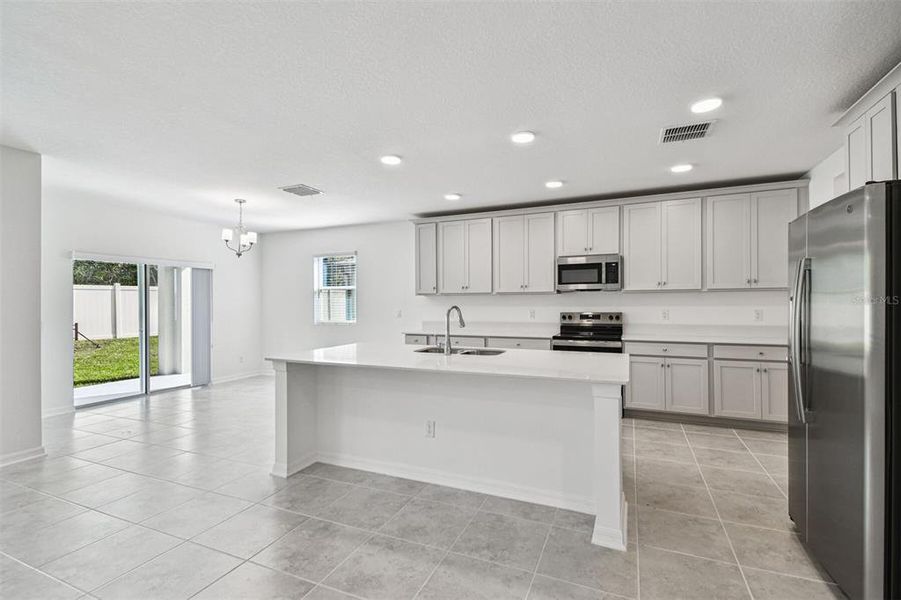 Furnished interior view inside a new home in Meadow Oaks, Hudson (Image 6).