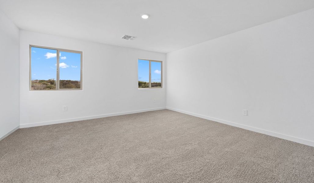 Spacious, unfurnished interior of a new home in The Oasis at Rocking K, Vail (Image 36).