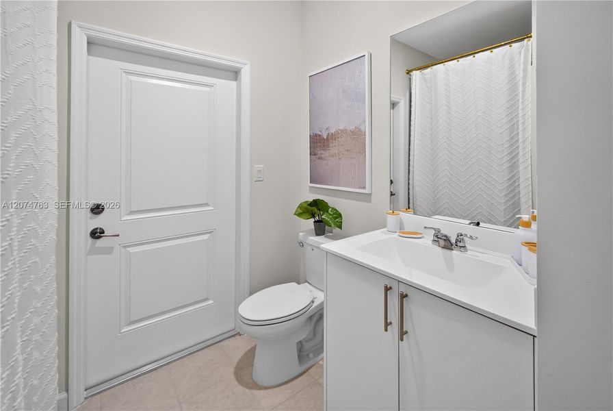 Furnished interior view inside a new home in Acacia Groves, Miami (Image 15).