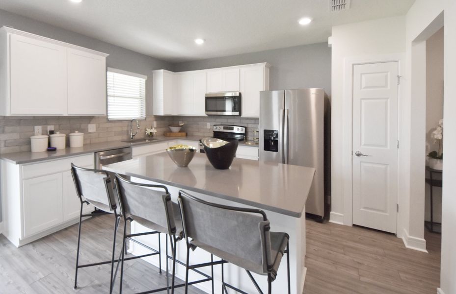 Furnished interior view inside a new home in Caloosa Cove, Labelle (Image 3).