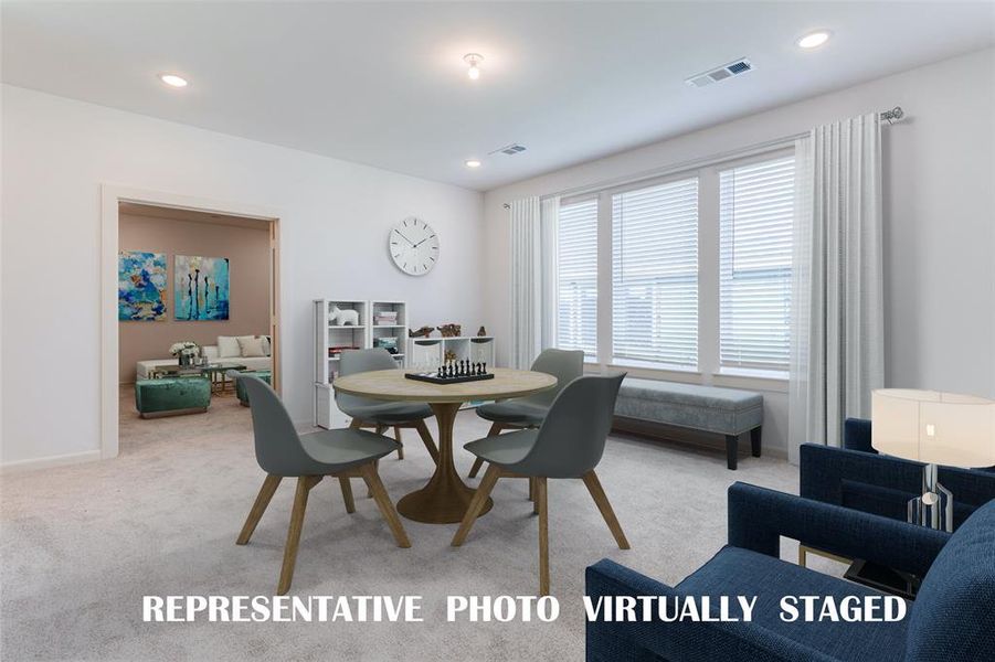 Family fun time never ends in this game room paired with a great media room!  REPRESENTATIVE PHOTO VIRTUALLY STAGED.