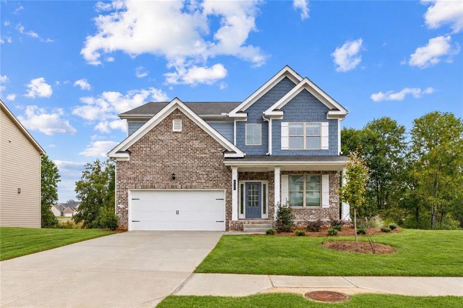 Front exterior of a new home in Hellen Valley, Braselton, GA, highlighting curb appeal (Image 27).