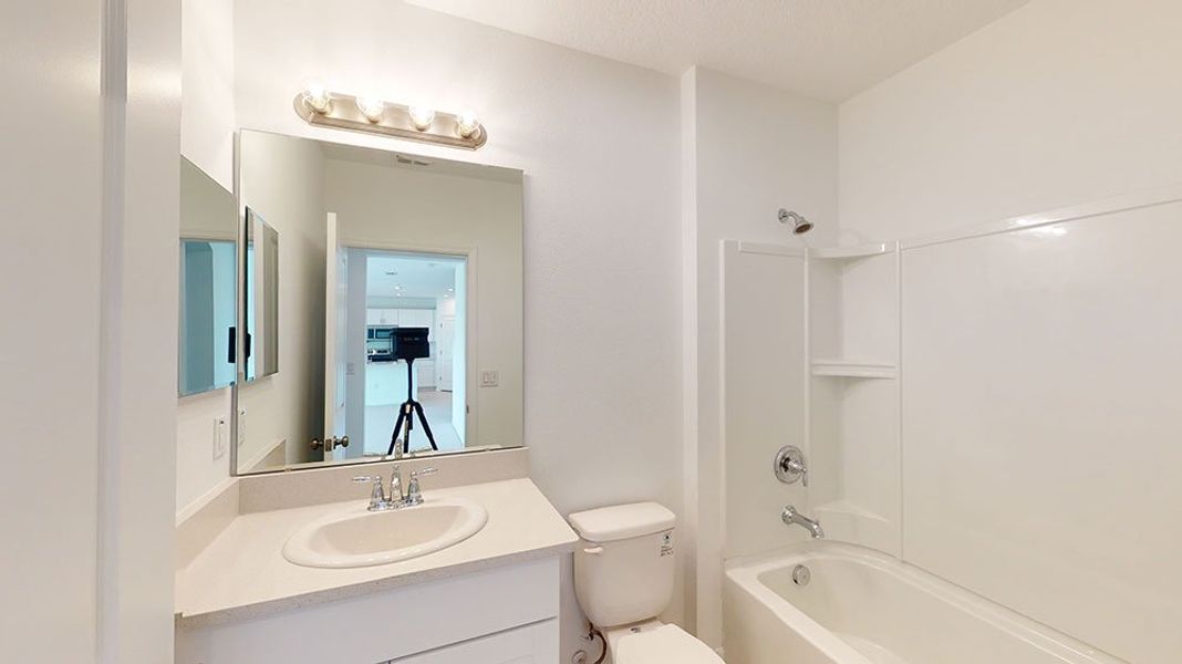 Representative furnished interior of a home built from the Azalea by Taylor Morrison in Riverfront, Edgewater (Image 6).