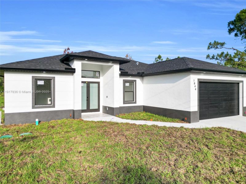 Exterior details and patio area of a home in , Lehigh Acres (Image 3). Exterior details and patio area of a home in , Lehigh Acres (Image 3).