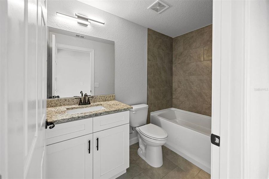 Furnished interior view inside a new home in , Bushnell (Image 9).