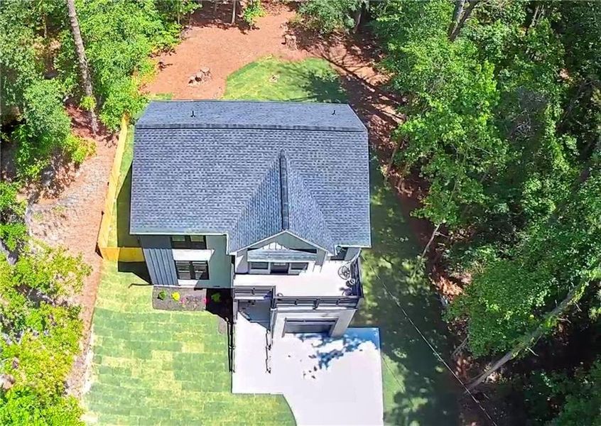 Front exterior of a new home in , Snellville, GA, highlighting curb appeal (Image 27).