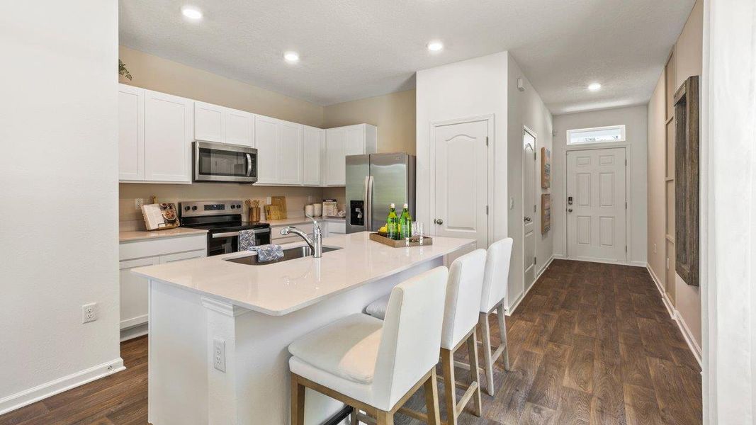 Representative furnished interior of a home built from the GREYSON by D.R. Horton in Hansen Creek, Jacksonville (Image 5).
