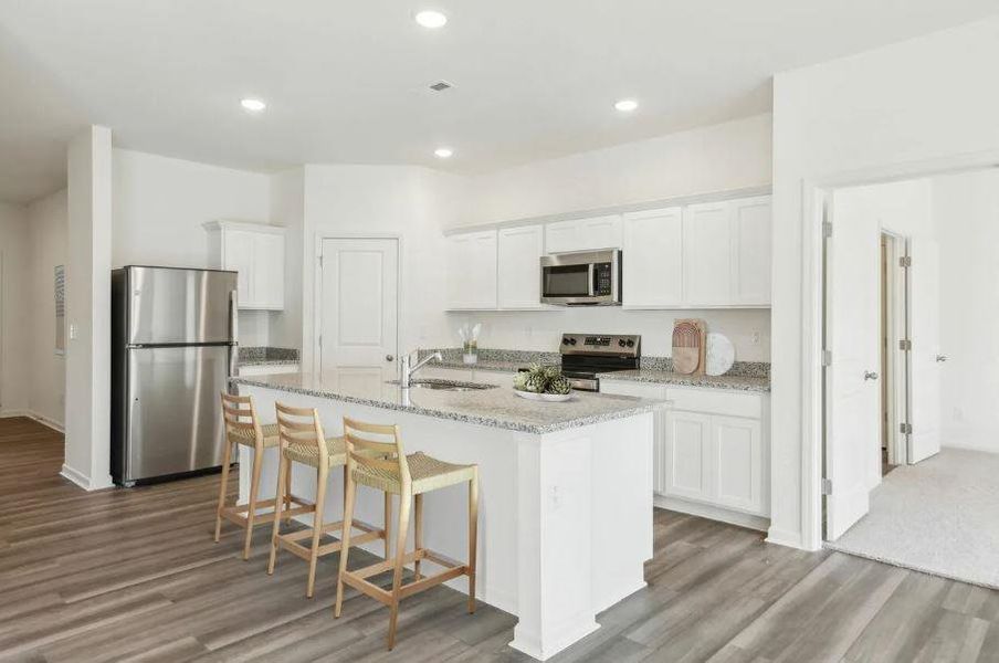 Light & Bright Kitchen with stainless appliancesLuna Elevation - Representative Photo