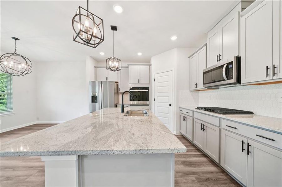 Furnished interior view inside a new home in Vines at Mill Creek - Estate Series, Braselton (Image 10).