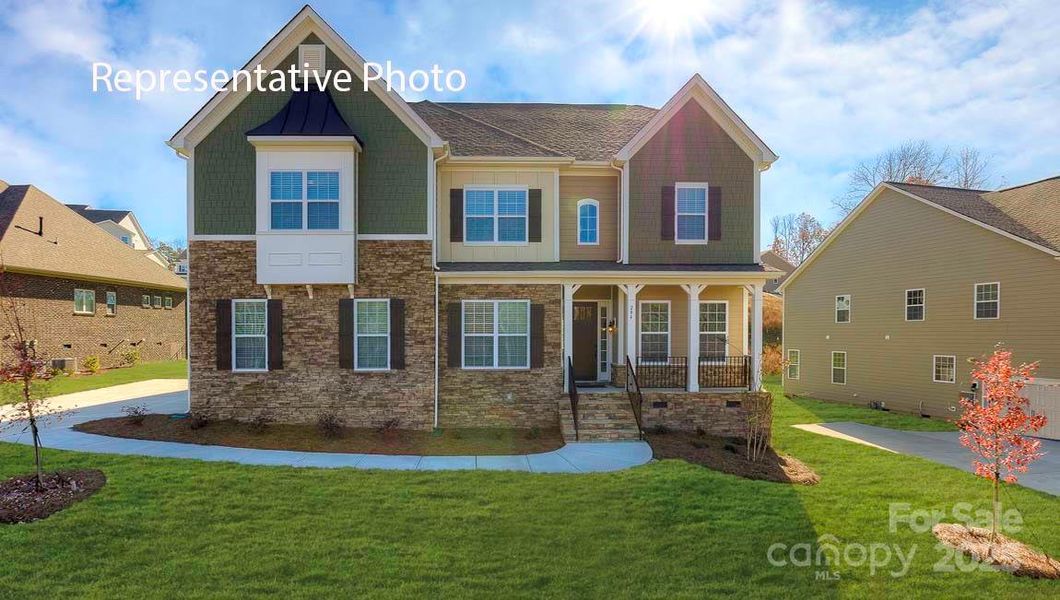 Front exterior of a new home in Sanctuary at Southgate, Indian Trail, NC, highlighting curb appeal (Image 1).