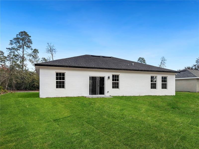 Exterior details and patio area of a home in , Ocala (Image 3).