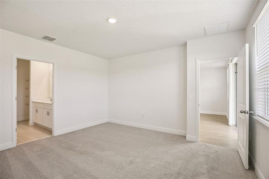 Spacious, unfurnished interior of a new home in The Reserve at Hammock Oaks - Classic Series, Lady Lake (Image 32).