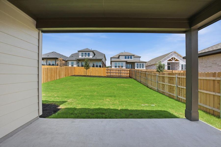 Exterior details and patio area of a home in Heritage, Dripping Springs (Image 3).