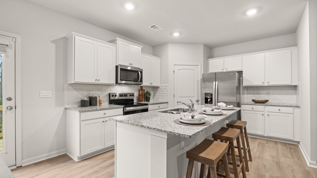Representative furnished interior of a home built from the Sudbury 24' Townhome by D.R. Horton in Mountain Park, Dahlonega (Image 7).