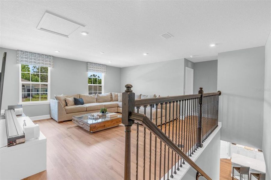 Furnished interior view inside a new home in Bella Terra, Clermont (Image 64).