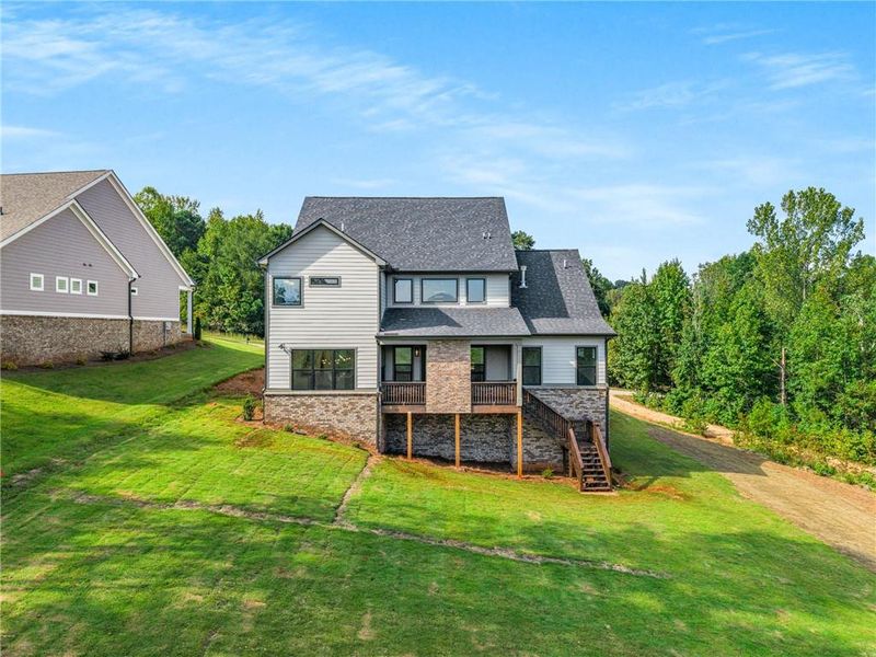Front exterior of a new home in , Jefferson, GA, highlighting curb appeal (Image 25).