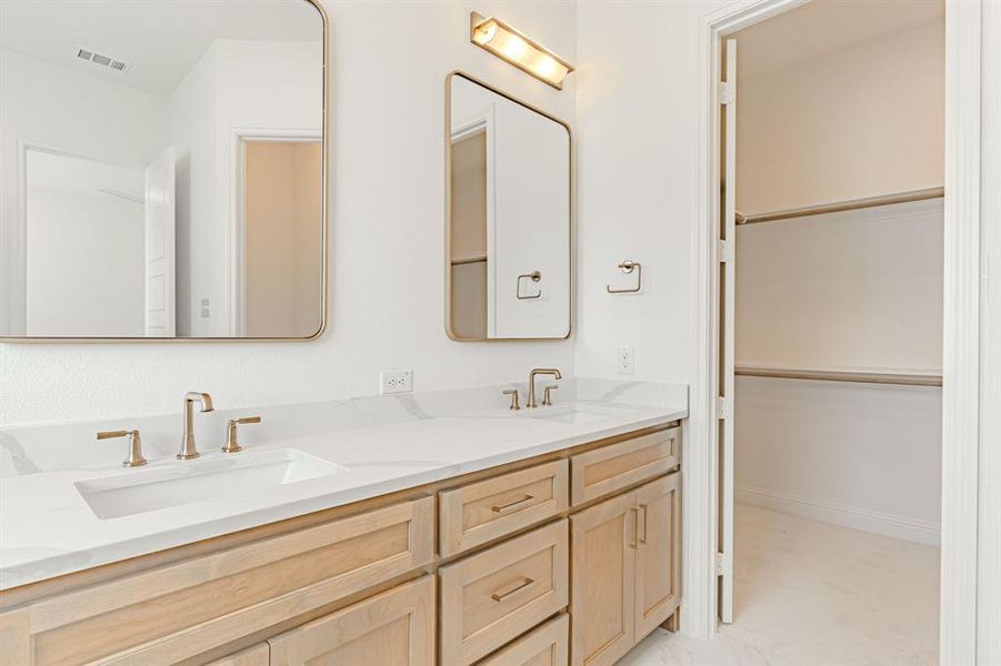 Owner's bath with custom cabinetry