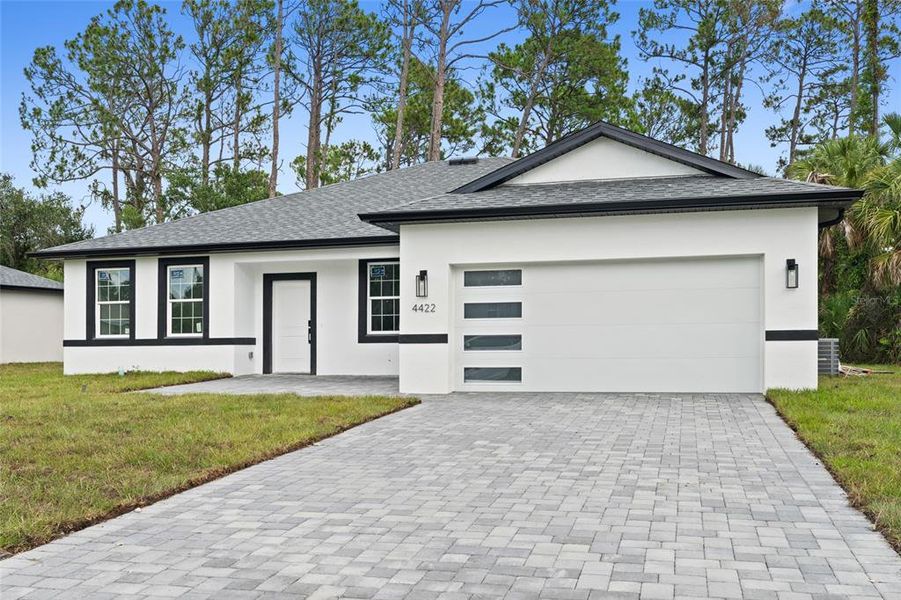 Front exterior of a new home in , North Port, FL, highlighting curb appeal (Image 21).