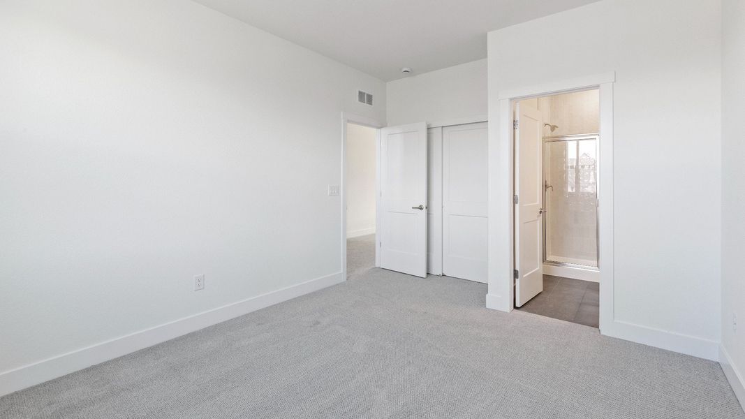 Furnished interior view inside a new home in Dillon Pointe - Journey, Broomfield (Image 27).