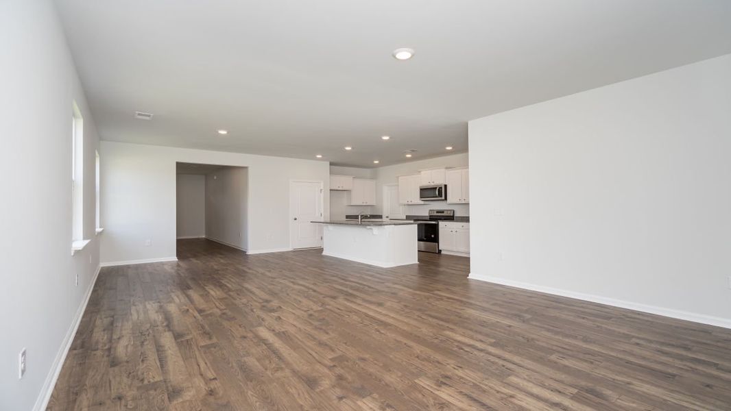 Representative unfurnished interior of a home built from the ROBIE by D.R. Horton in Indigo Preserve, Leland (Image 14).