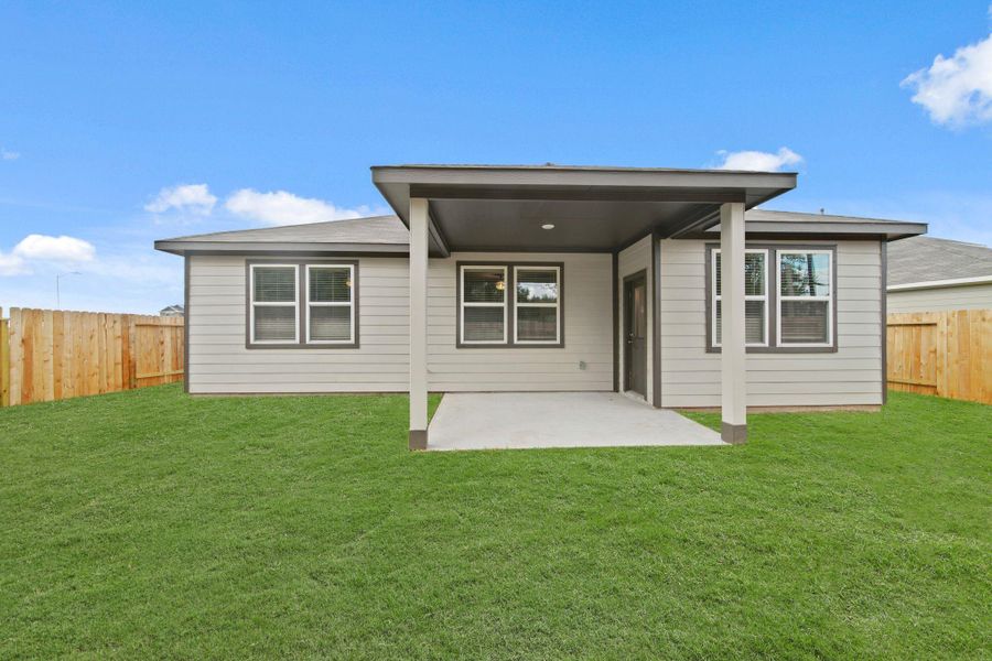 Exterior details and patio area of a home in Russell Ranch, Bay City (Image 19).