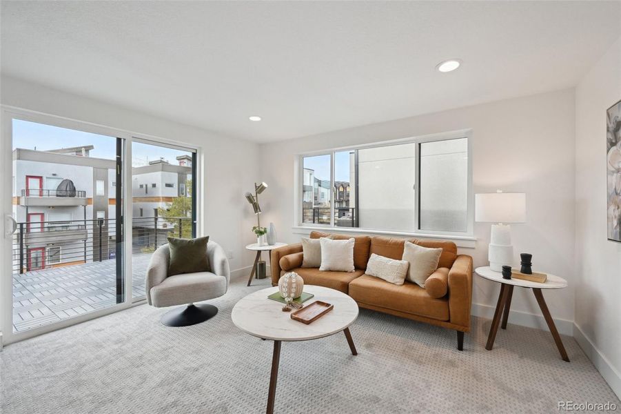 Third floor bonus room, walk out roof deck, wet bar and views!