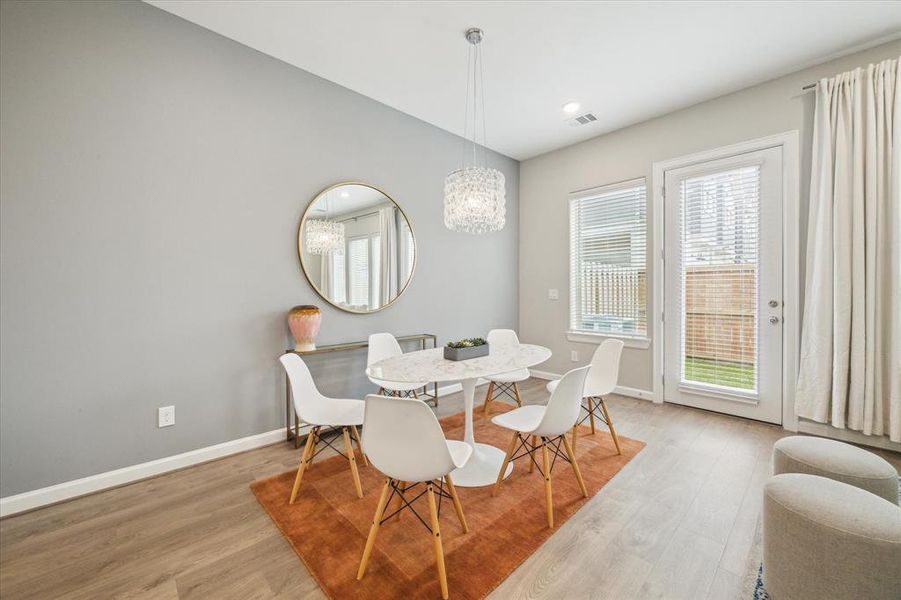 Dining area with direct access toback yard space.