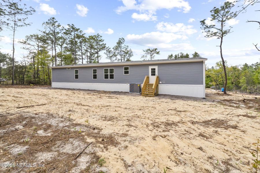 Exterior details and patio area of a home in , Hawthorne (Image 24).