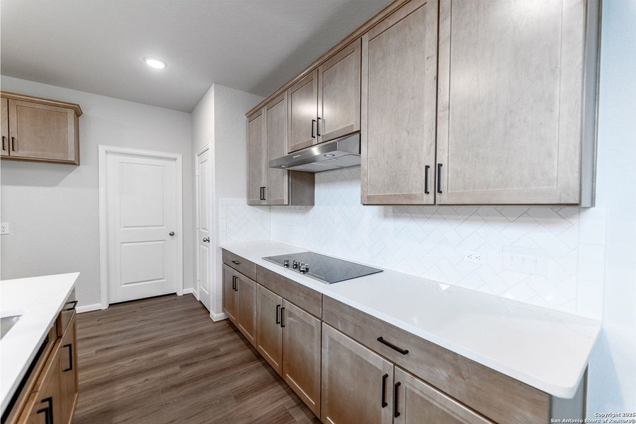 Furnished interior view inside a new home in The Woodlands at Medina Hills, Mico (Image 6).