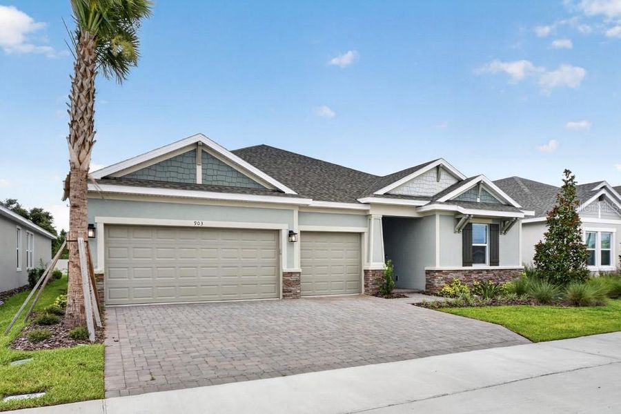 Front exterior of a new home in Center Lake Ranch Community Group Page, St. Cloud, FL, highlighting curb appeal (Image 22).